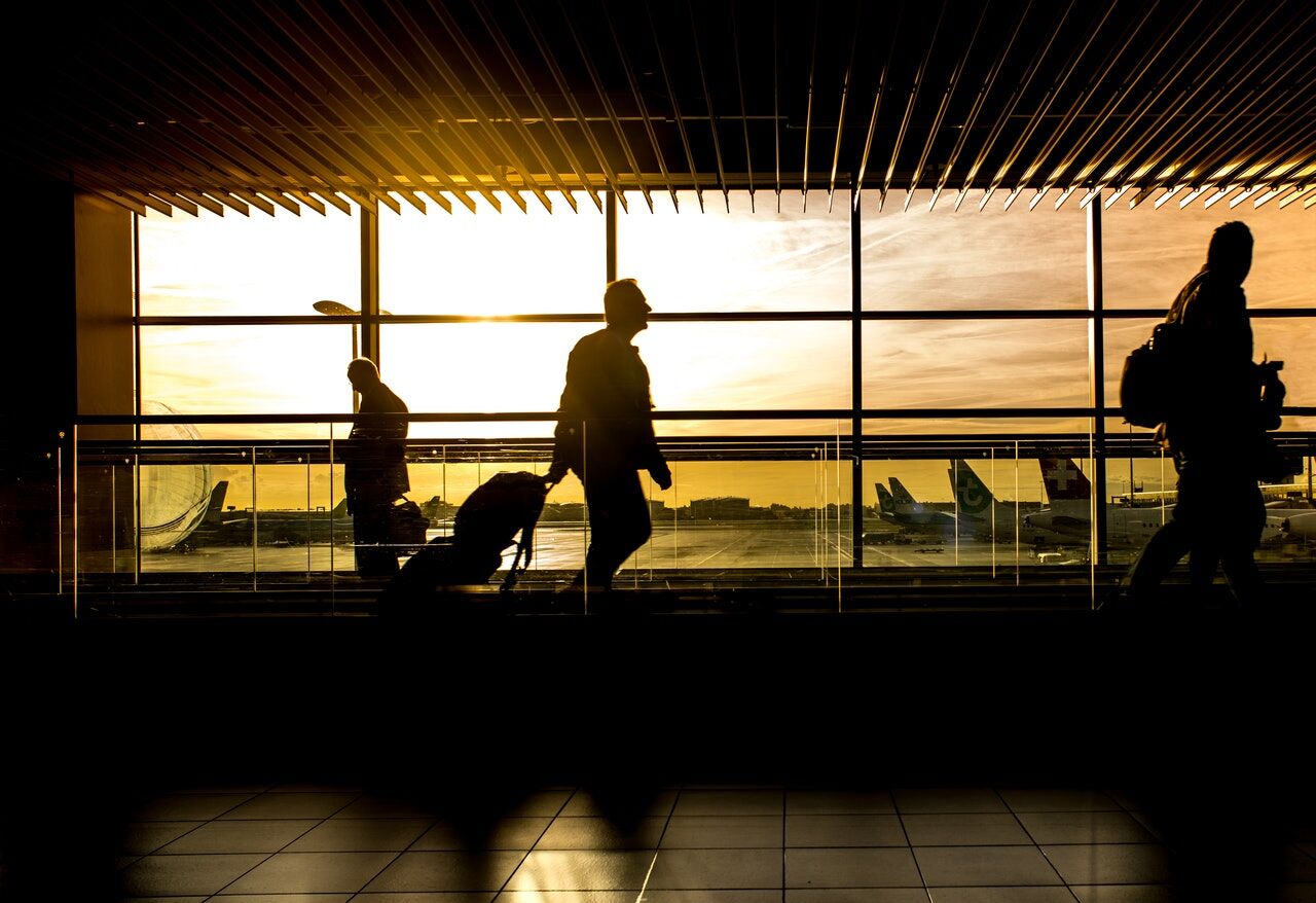 Man at airport waiting for his flight