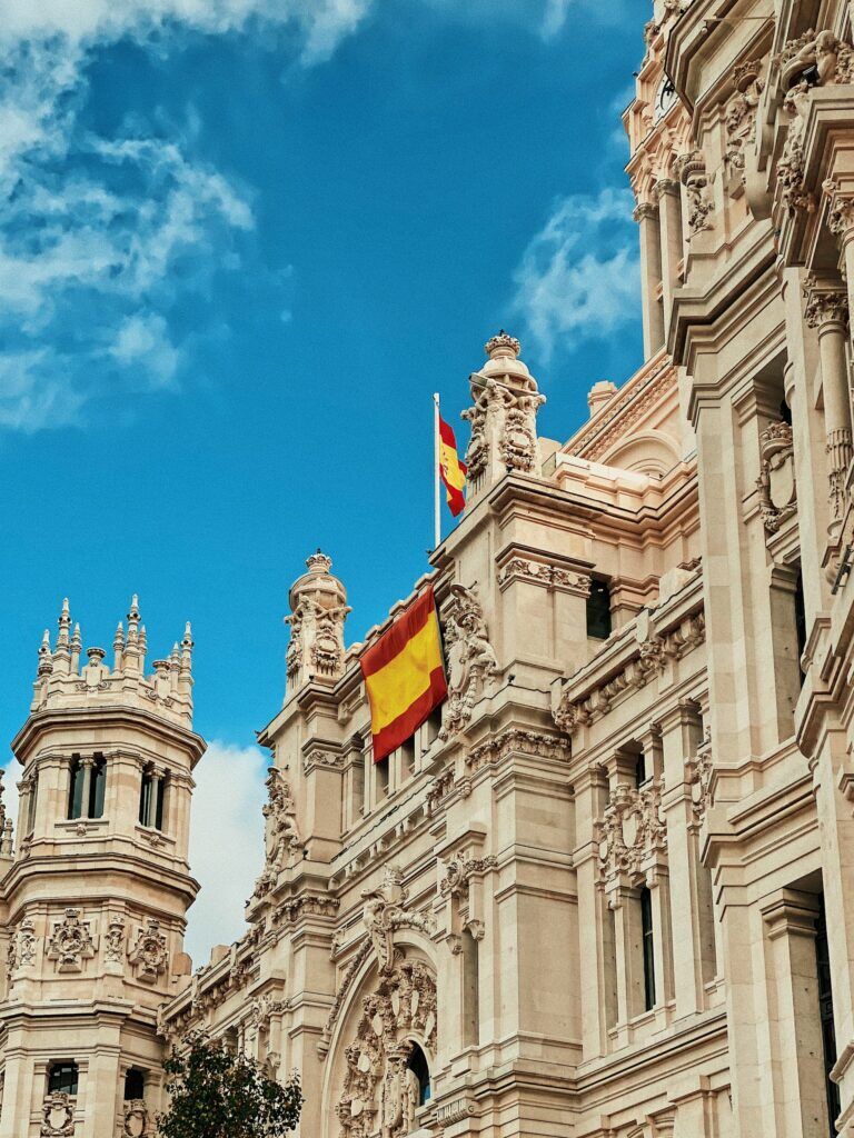 Building in Madrid with Spanish flag